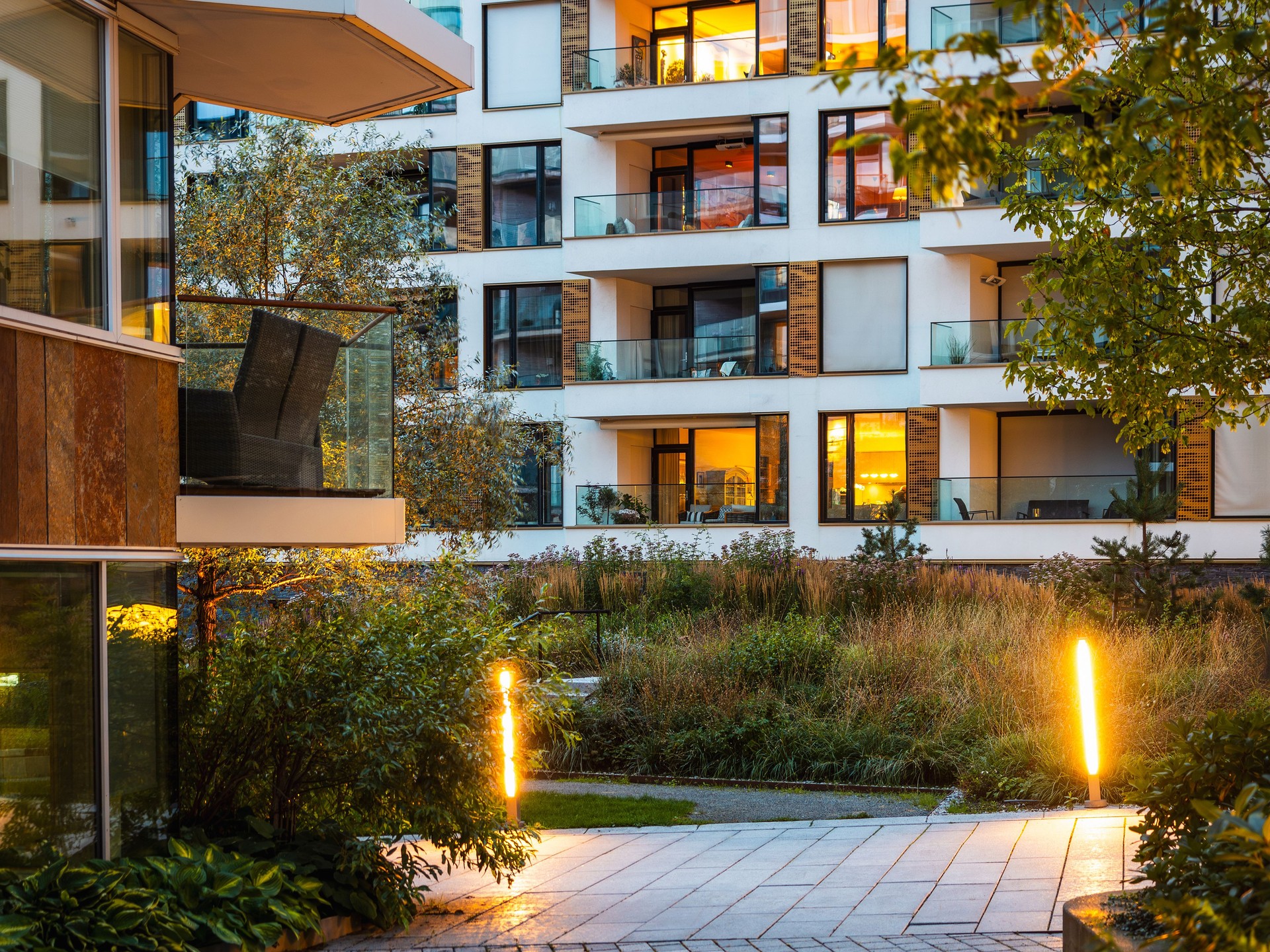 View from inner courtyard on modern apartment house in Oslo city district. Modern cozy residential buildings, scandinavian architecture